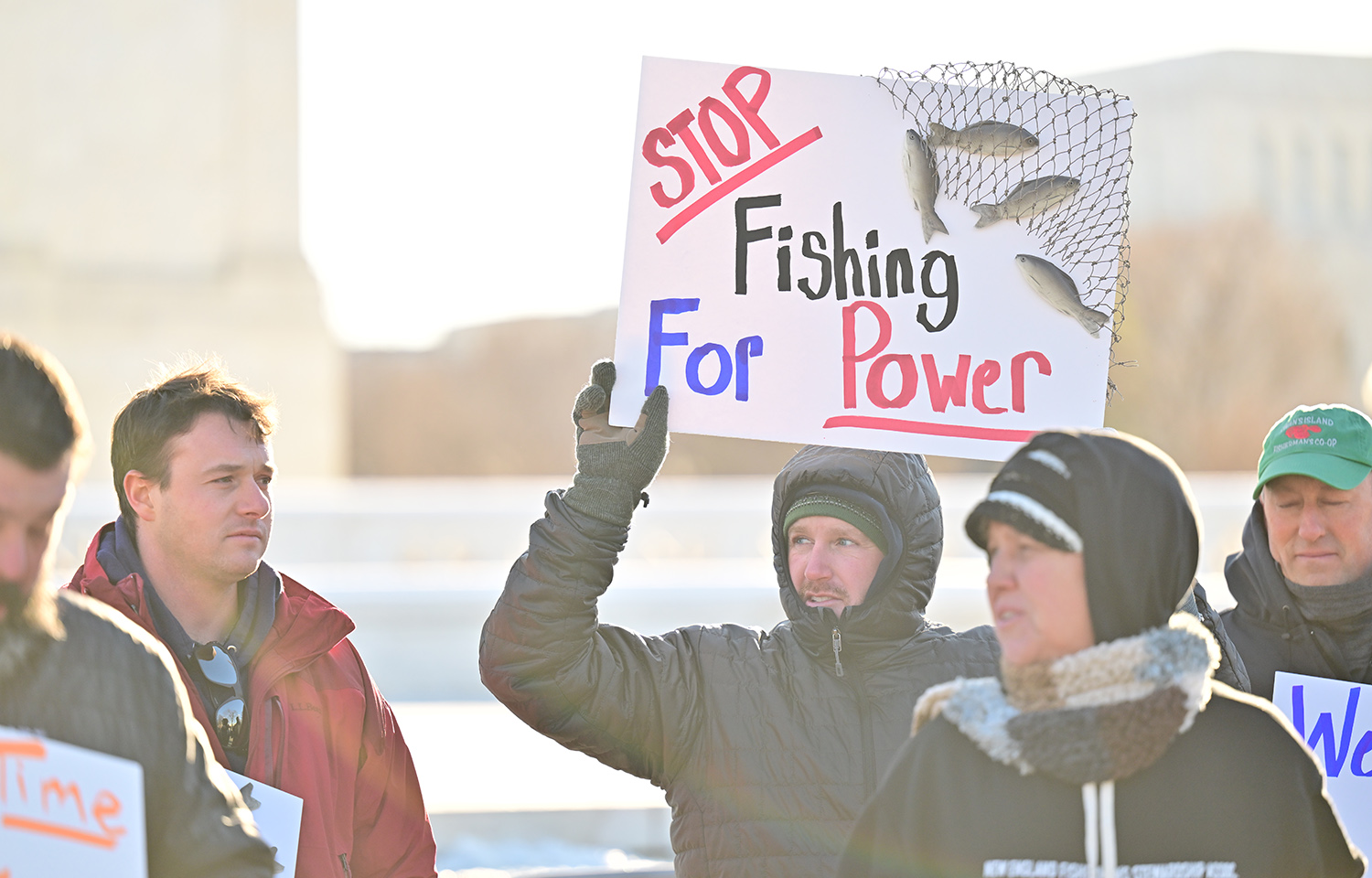 A photo of fishermen protesting in front of the U.S. Supreme Court.