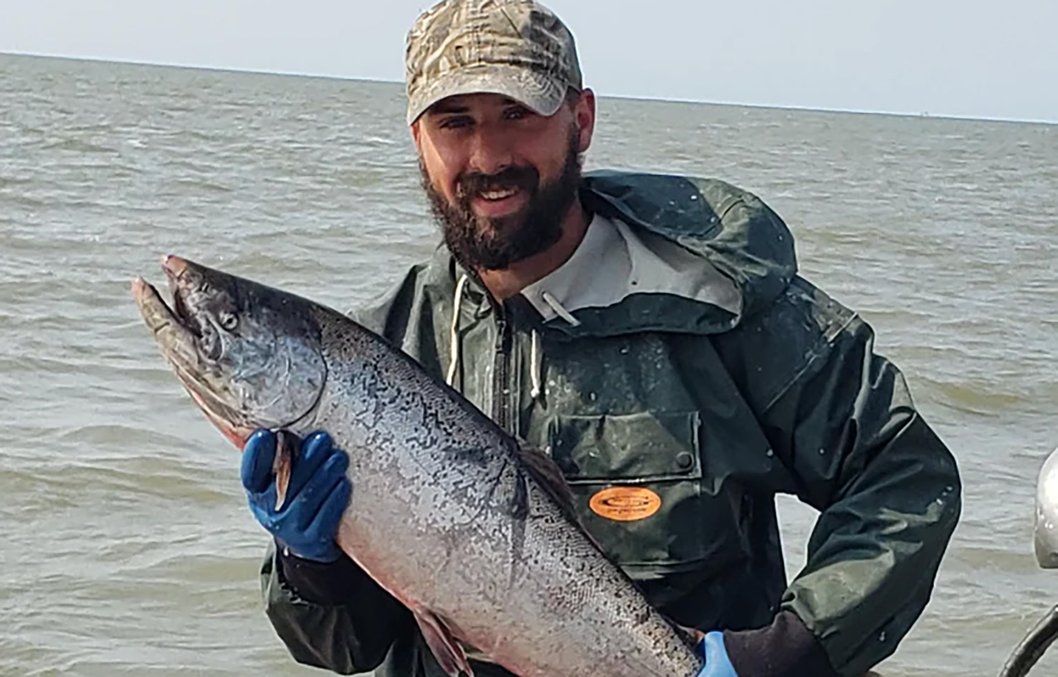 Joseph Bonanno, owner of M.I.F. Seafood, holding a salmon