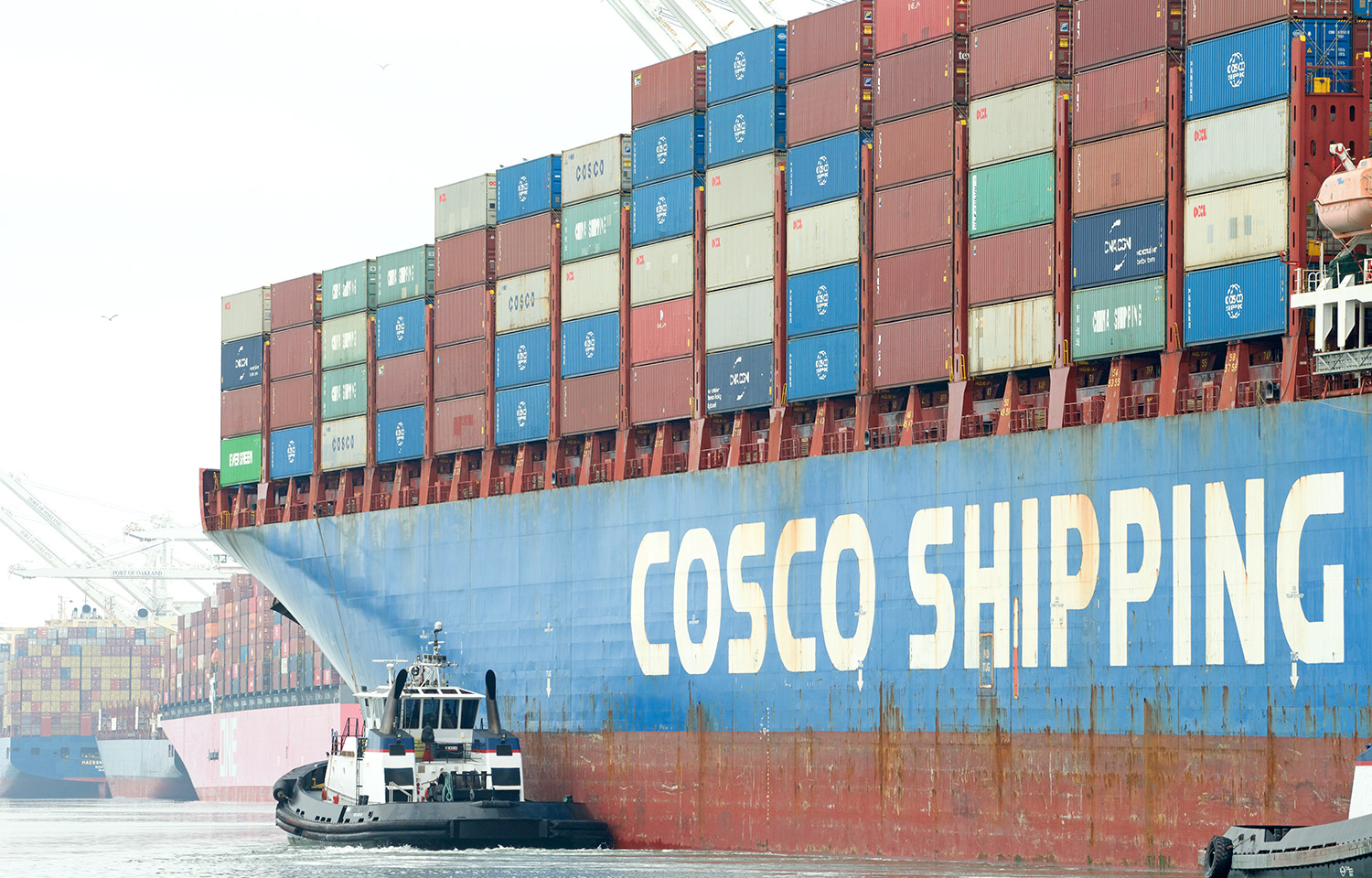 A Cosco shipping vessel at a port