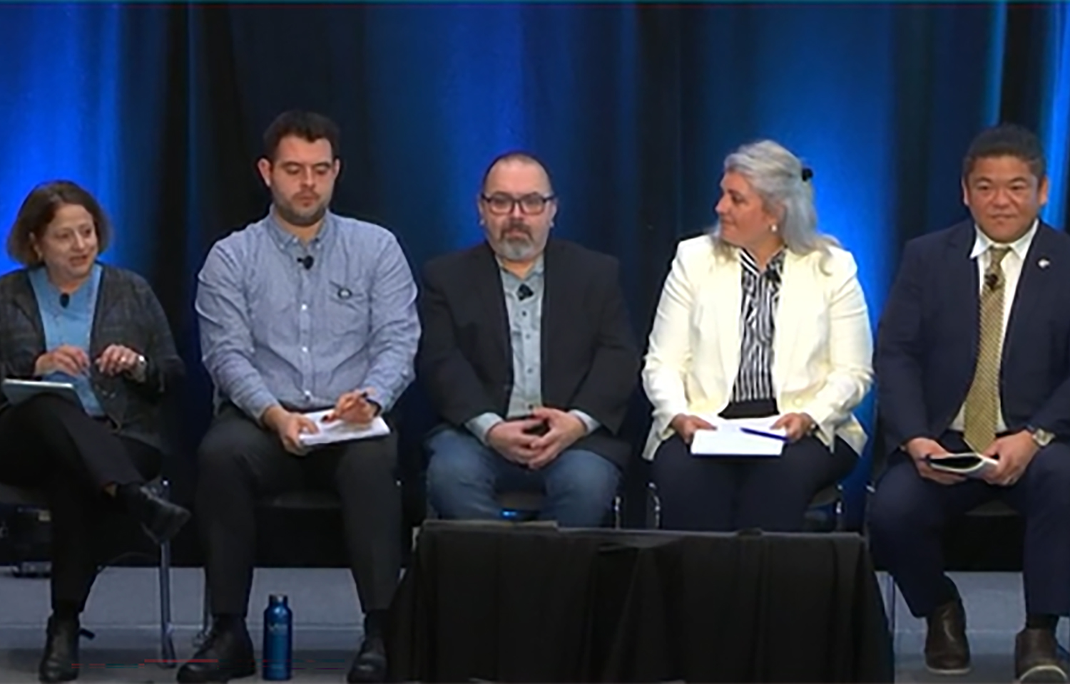 Panelists speaking on a SENA panel titled "Making Critical Connections in the Seafood Supply Chain"