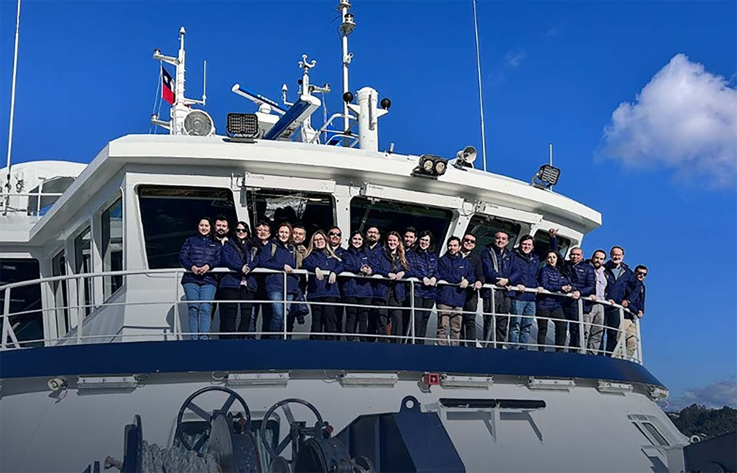 Blumar employees on board the firm's new wellboat Ronia Polaris