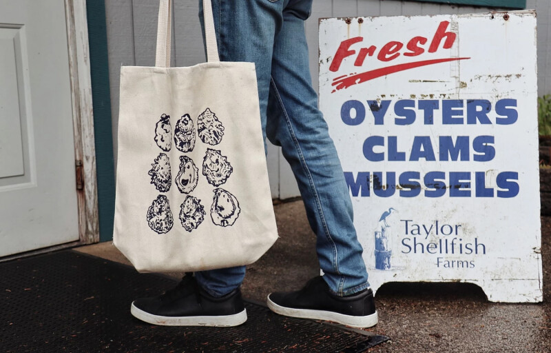 The exterior of a seafood market offering Taylor Shellfish oysters, clams, and mussels