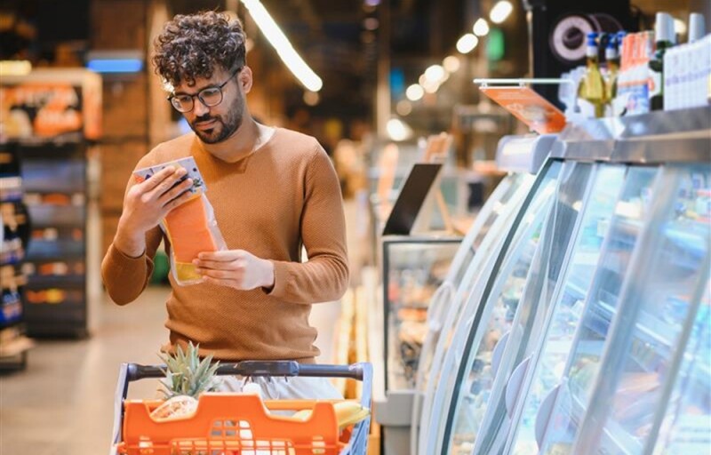 a person shopping for salmon