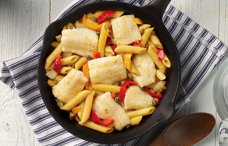 Mediterranean-Style Sole Pasta, which features wild-caught sole with penne pasta, roasted yellow and red peppers, and diced tomatoes in a lemon caper sauce