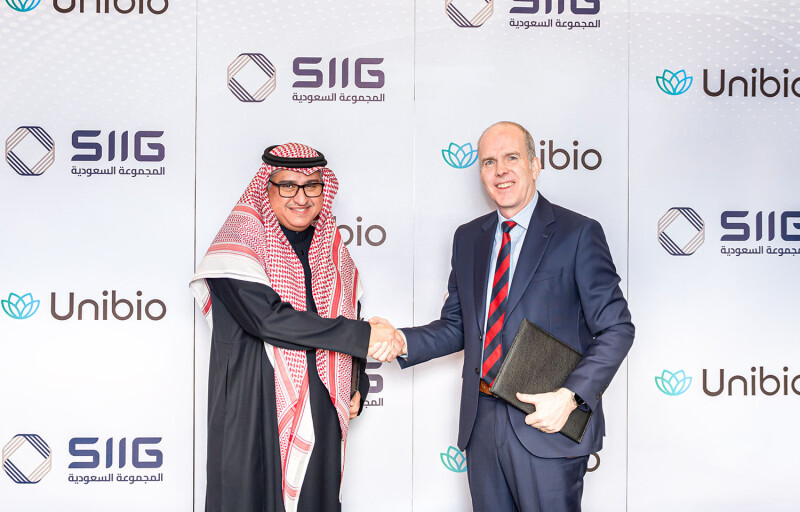 SIIG CEO Abdulrahman Alismail and Unibio CEO David Henstrom shake hands