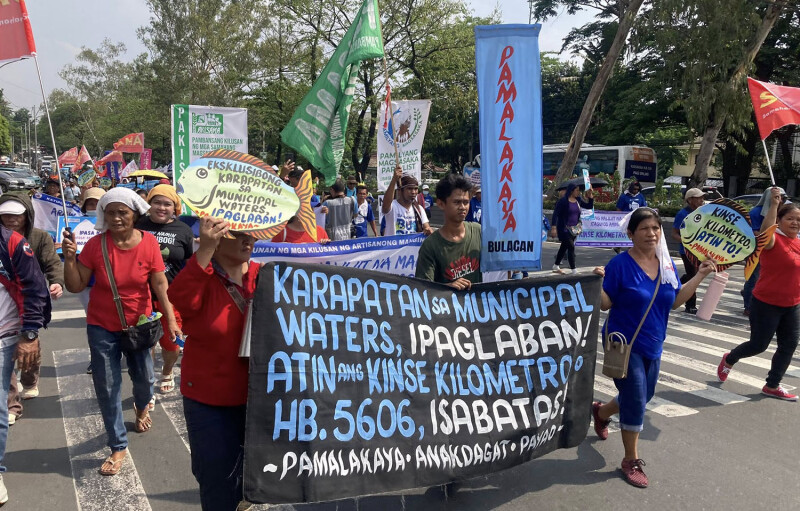 Philippine fishers protesting the encroachment of commercial vessels into waters traditionally designated for small craft