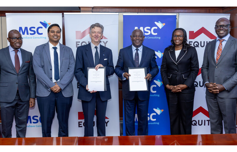 Equity Group Holdings' and MicroSave Consulting's representatives signing the agreement