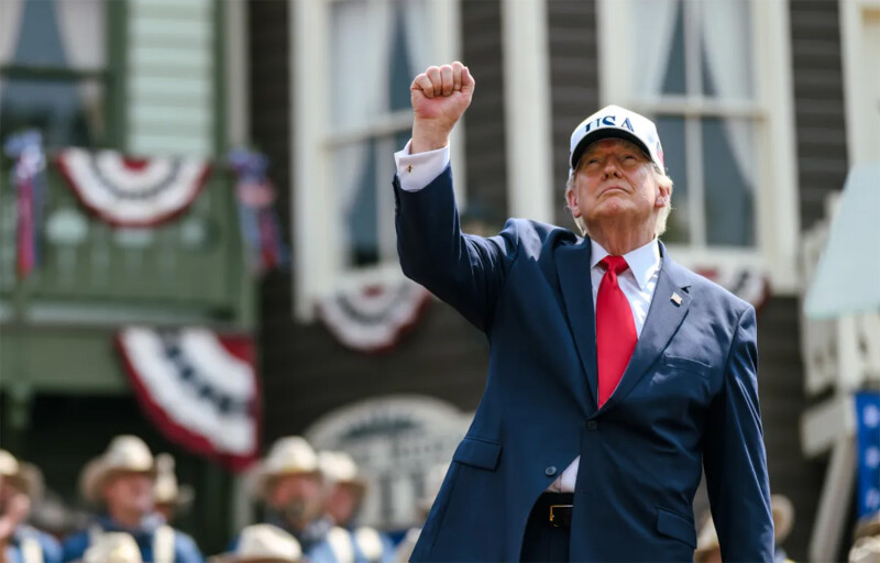 U.S. President Donald Trump with a raised fist