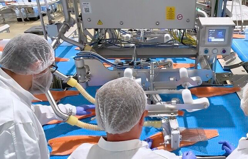 A salmon processing line at First Seafood