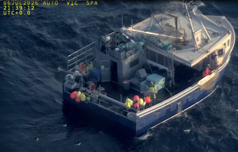An aerial view of a fishing boat at sea