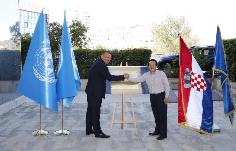FAO Director-General QU Dongyu (right) and State Secretary Ivan Matijević