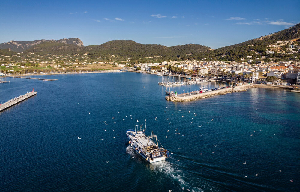 A fishing vessel returning to port in Spain