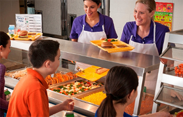 Students being served lunch in the U.S.