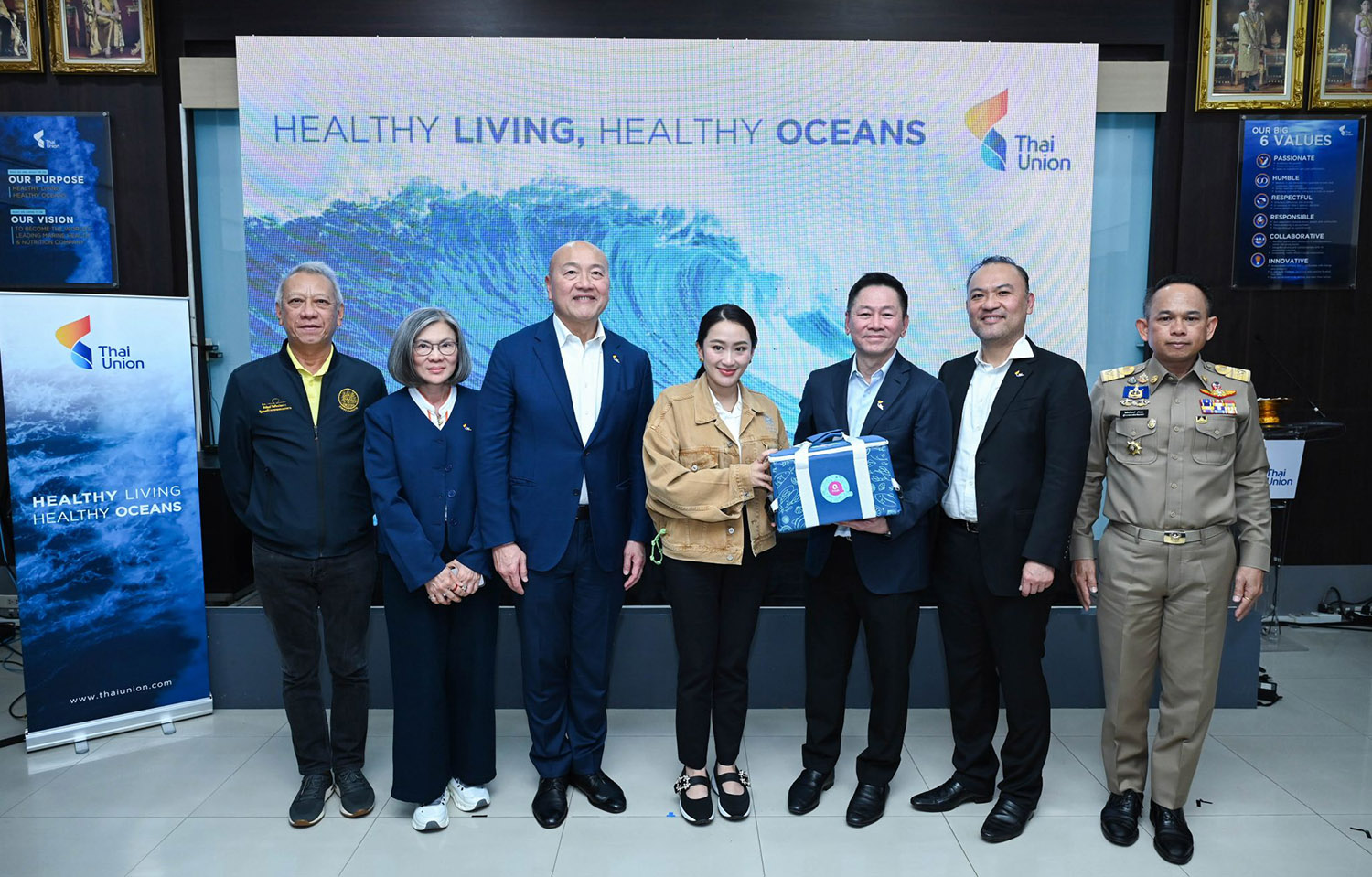 Thai Union staff with Thai Prime Minister Paetongtarn Shinawatra at one of the firm's seafood factories