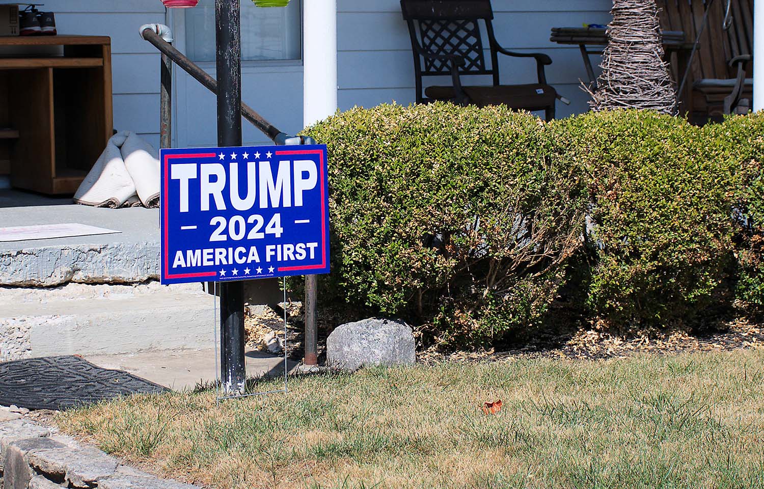 A yard sign in Dayton, Ohio reads "Trump, 2024, America First" | Photo courtesy of Ray Geiger/Shutterstock