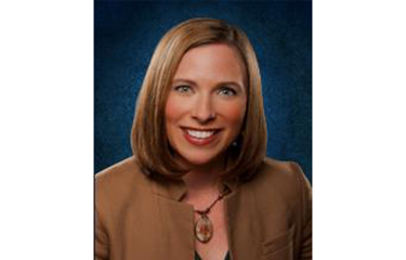 Headshot of Jacqui Lyons