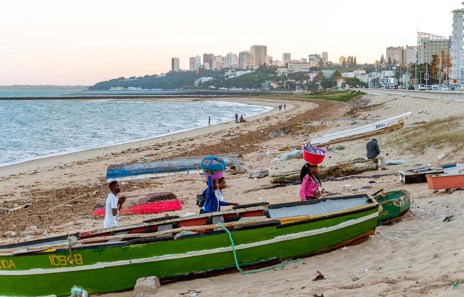 Fishers bring their catch onto shore in Maputo, Mozambique