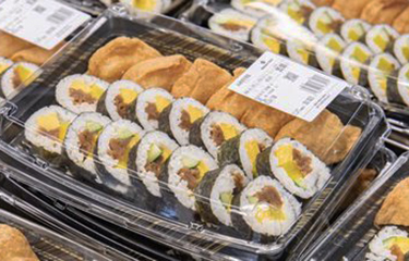 Sushi offerings from Kroger in plastic packaging.