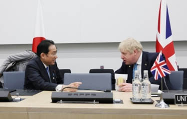 Japan Prime Minister Fumio Kishida and U.K. Prime Minister Boris Johnson meet.