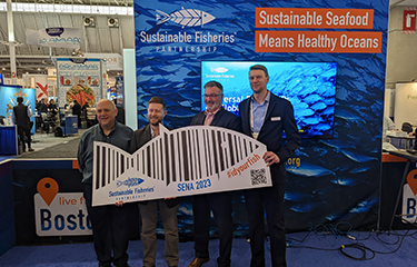 Publix Supermarkets Seafood Director Guy Pizzuti, SFP Global Policy Director Brad Spear, High Liner Foods VP of Sustainability Bill DiMento, and Thai Union North America Director of Sustainability Blake Stok pose for a photo celebrating the launch of new pilot projects.