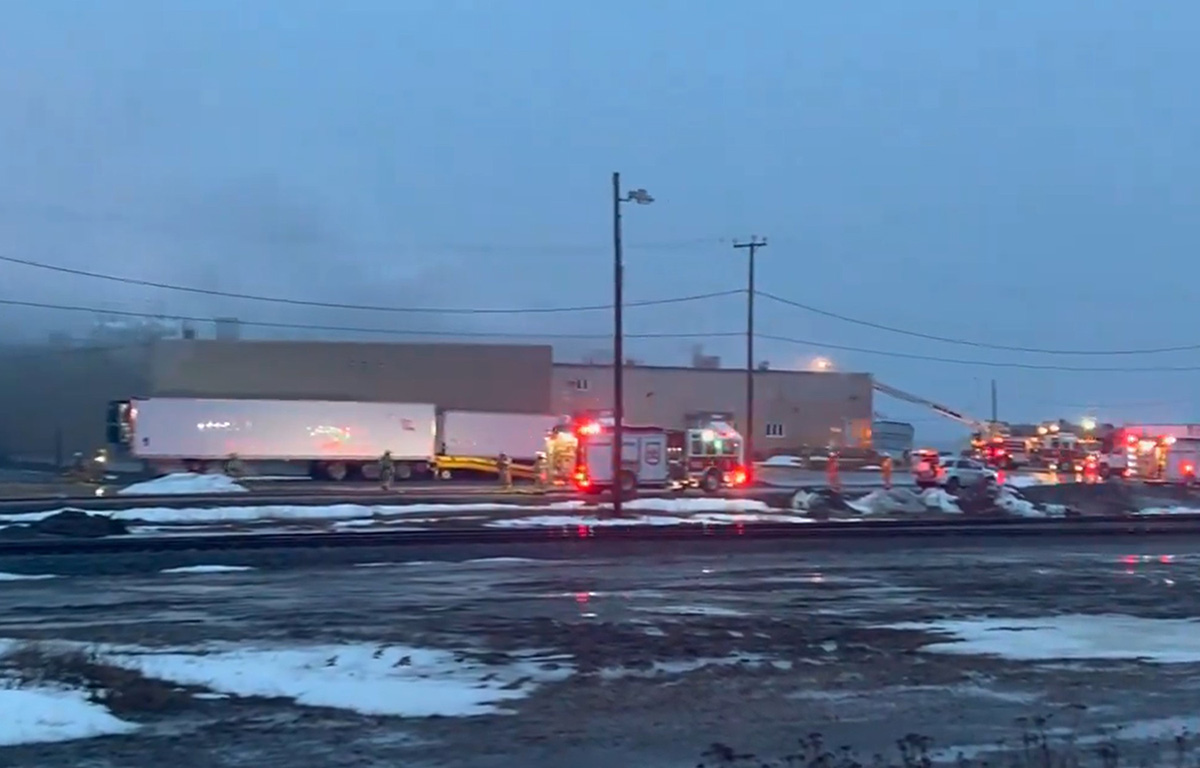 Crews responding to a fire at the Fruits de mer de l'Est du Québec processing plant