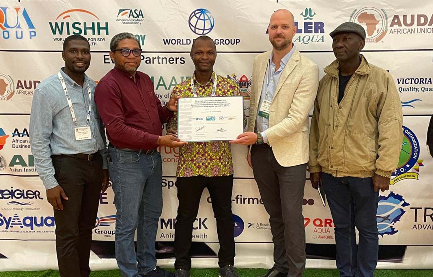 Members of the the Aquaculture Stewardship Council and the Chamber of Aquaculture Ghana pose with the recently signed deal