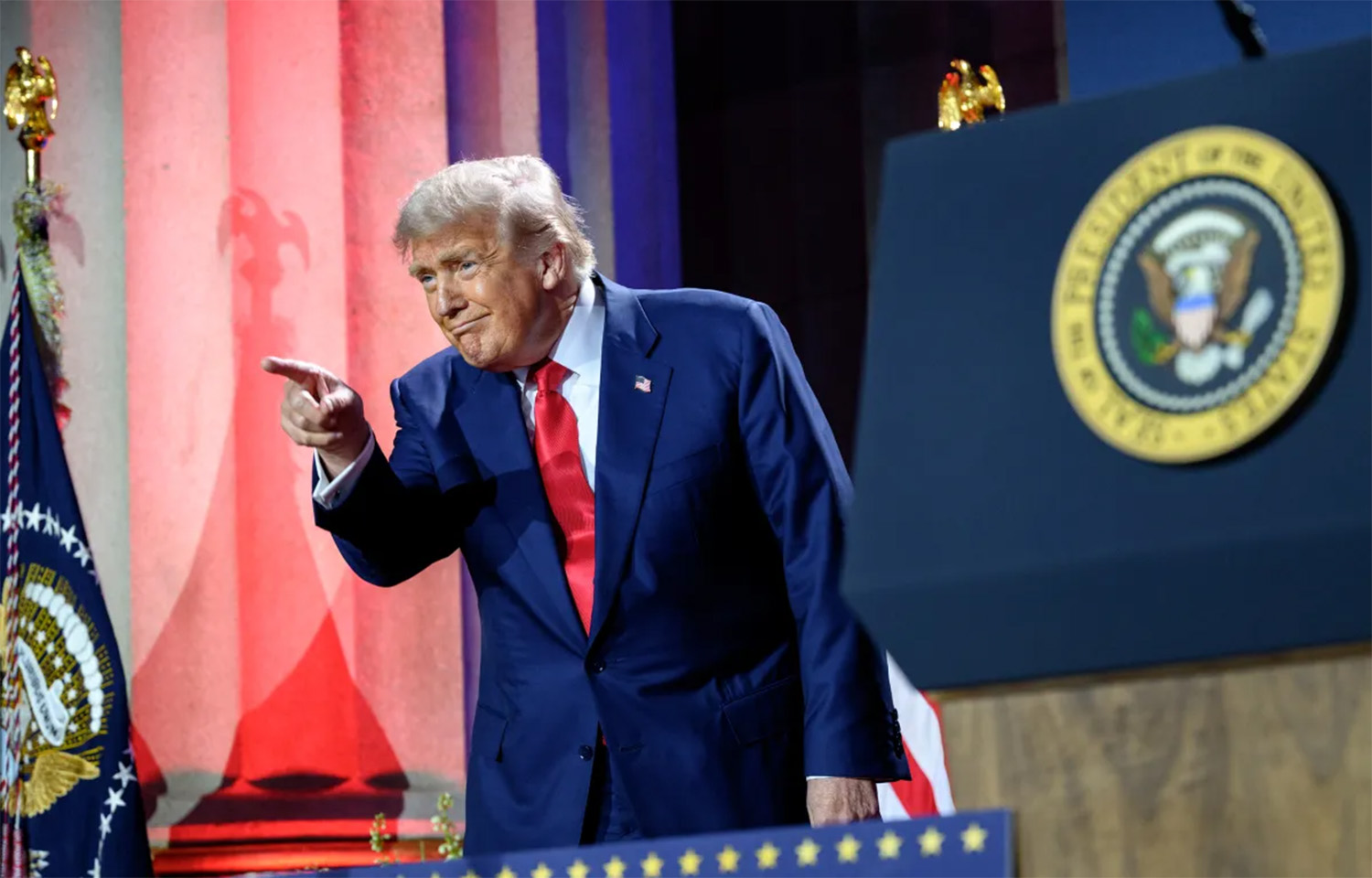 U.S. President Donald Trump pointing