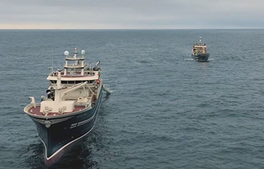 Síldarvinnslan vessels at sea.