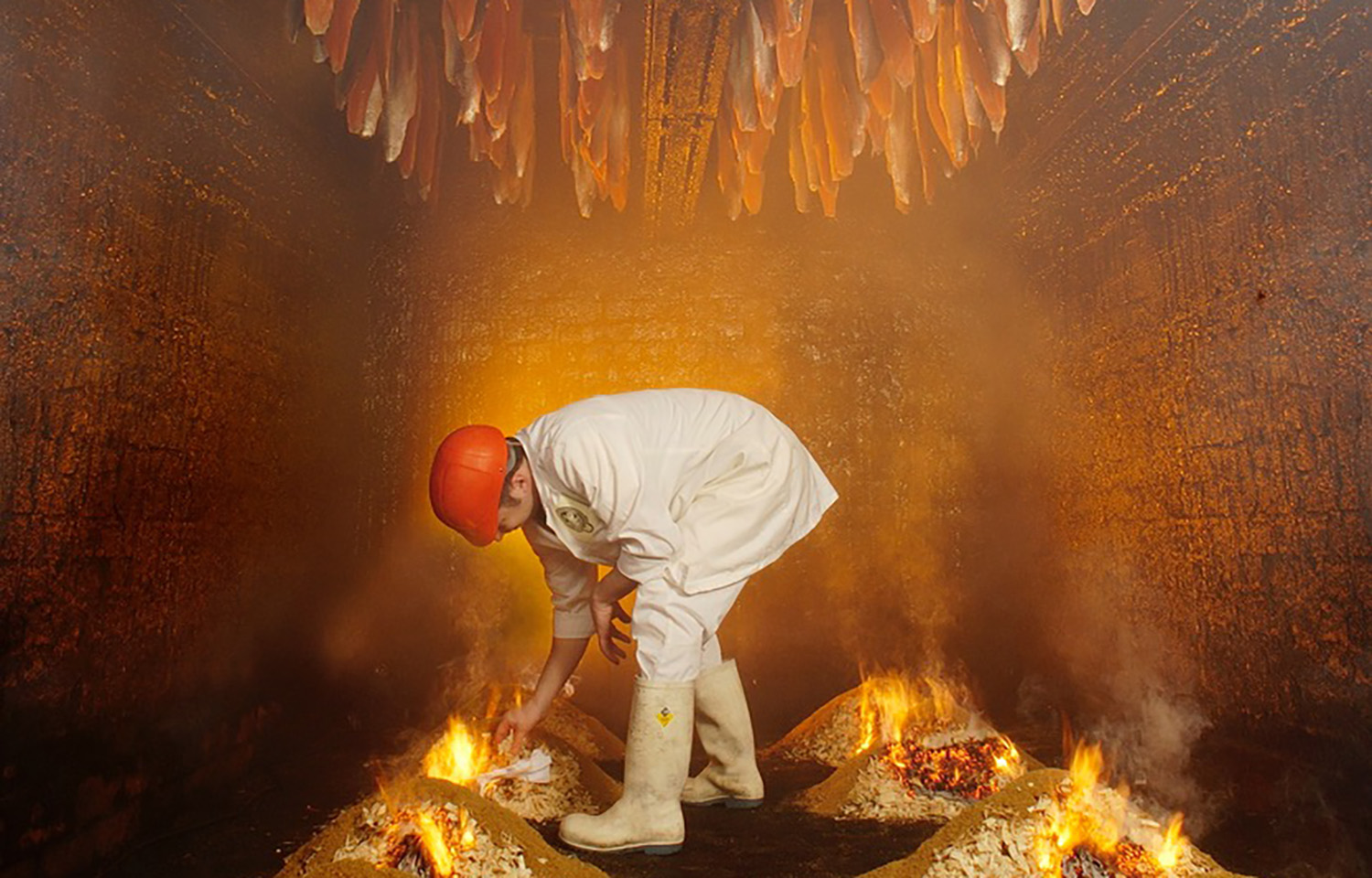 A John Ross employee in one of the company's salmon-smoking kilns