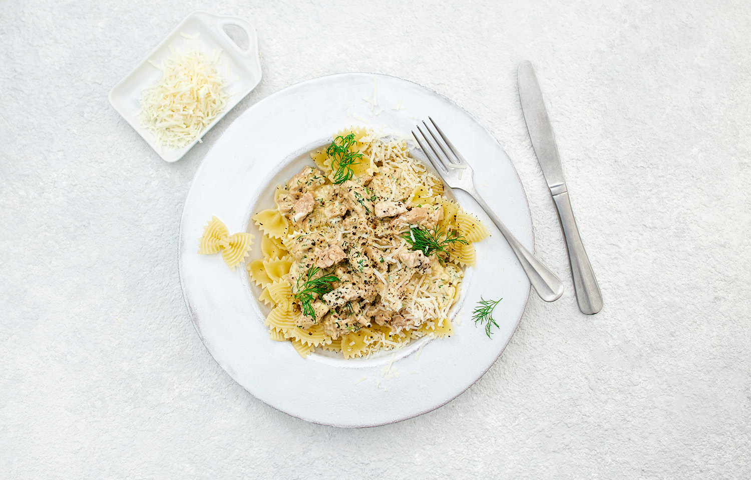 Hailia pulled rainbow trout over pasta