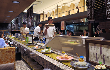 The interior of a sushi restaurant in Tokyo, Japan.