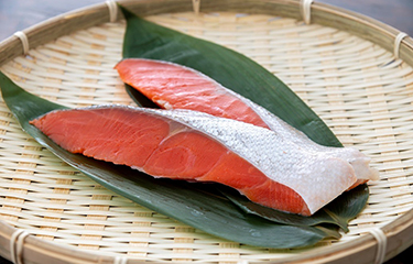 Slices of salmon being offered as part of Seven & I Group's Alaska Seafood Fair.