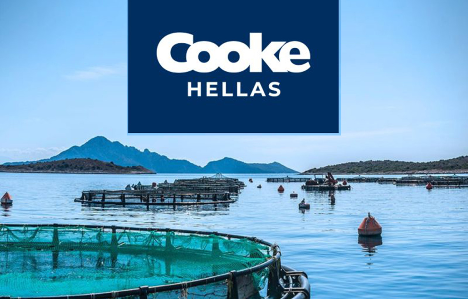 A series of net pens with the Cooke Hellas logo