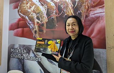 Fisherfarms CEO Imelda J. Madarang showing off its new Corn & Coconut Breaded Shrimp.
