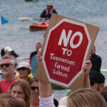 A sign reading "No to Tasmanian farmed salmon"