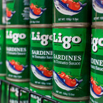 A shelf of Ligo canned sardines.