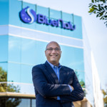 BlueNalu CEO Lou Cooperhouse standing in front of the company's offices.