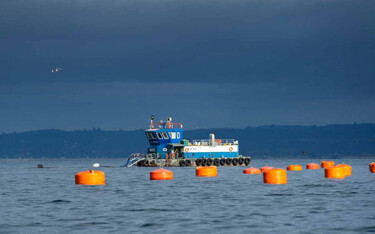 A work boat tends to a Salmones Austral aquaculture operation.