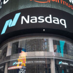 A banner advertising the Nasdaq Stock Exchange, where Pingtan Marine is facing penalties after failing to file its latest financial reports.