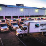 Samuels & Son Seafood trucks lined up at the distribution center.