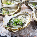 Fresh Pacific oysters on ice.