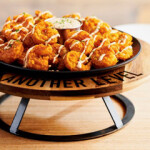 Outback Steakhouse, known for its fried Bloomin’ Onion appetizer, is featuring a new Bloomin’ Shrimp appetizer
