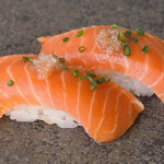 Two pieces of Nigiri sushi, made using Wildtype's cell-based salmon