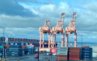 A year after scrambling to stave off collapse, the U.S. ports of Seattle and Tacoma are dealing with an overload of traffic.