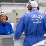Two Lerøy Seafood Group ASA workers in one of the company's processing plants.