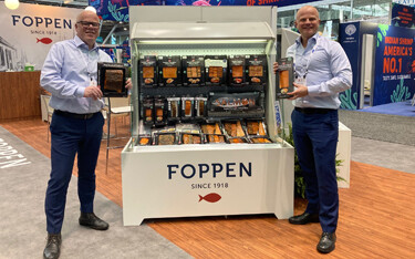 Brothers Remko and Wilbert Vedder with their products at Seafood Expo North America.