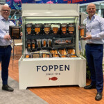 Brothers Remko and Wilbert Vedder with their products at Seafood Expo North America.