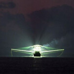 A fishing boat at night.