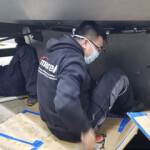 Marel technicians installing processing machinery