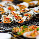 Oysters situated on a grill in Xiamen, China.